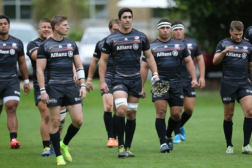 Saracens players take to the field. Saracens v Ospreys, Pre-Season Friendly, HAC Grounds, London, 21/08/2014 © Matthew Impey/Wiredphotos.co.uk. tel: 07789 130 347 email: matt@wiredphotos.co.uk